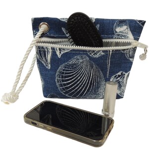 Monedero de pulsera náutico, conchas marinas sobre tela para exteriores azul marino, forrado con lona