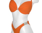 2-piece pageant swimsuit available in 9 colors, 4 sizes. comes with padded inserts in the top