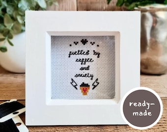 Fuelled by coffee and anxiety cross stitch in white box frame