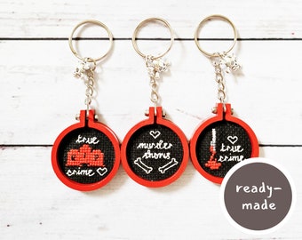 True Crime Keyring: Hand-Painted Red Wooden Keychain with Skull Charm