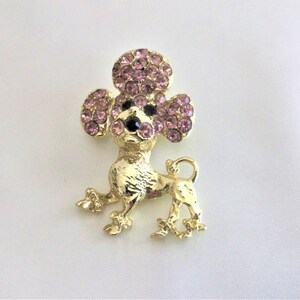 Poodle Dog Brooch or Pin with Lavender Rhinestones Black Eyes Gold Body Vintage 1950s