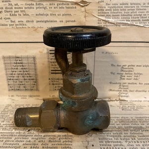 Vintage brass water tap from a boiler