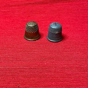 Set of two vintage sewing thimbles. Old thimbles.