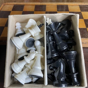 vintage plastic chess pieces.