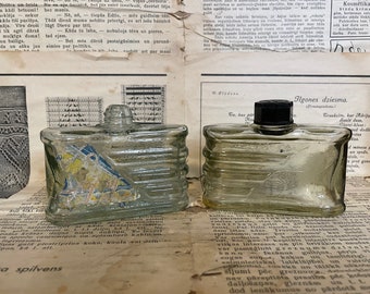 Set of two vintage cologne bottles