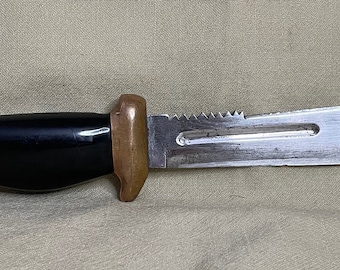 An old homemade survival hunting knife