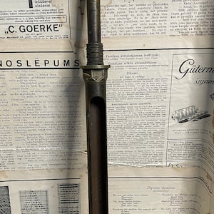 Old boiler thermometer frame made of brass