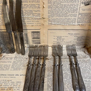A set of old knives and forks. Emos, Solingen, Boker.
