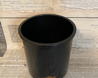 Vintage bakelite can in black color