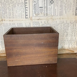 Vintage small wooden storage box. Old box for spices.