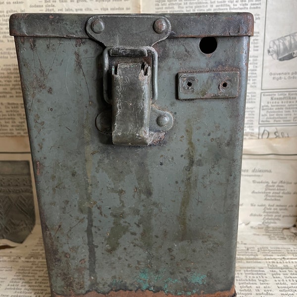 Vintage rusty metal box from Soviet civil or military equipment.