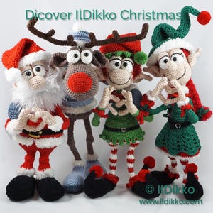 May include: Four crocheted Christmas dolls including Santa Claus with a white beard, a reindeer with brown antlers and a red nose, and two elves in green and red outfits. The text "Dicover IlDikko Christmas" appears at the top of the image.