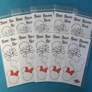 May include: Ten clear plastic bags each containing a white card with a black and white outline of a skull and crossbones, a Mickey Mouse head, and a red bow. The text "SHIP SHAPE STIX" is printed on each card.