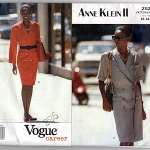 May include: A sewing pattern for a dress by Anne Klein II. The pattern is for sizes 12-14-16. The pattern shows two different styles of dresses, one red and one plaid.