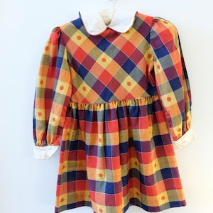 1960&#39;s Vintage Girls Cotton/Poly Red Yellow Blue Plaid with Apples Fit And Flare Dress Waist Pleated Full Skirt Long Sleeve Peterpan Collar