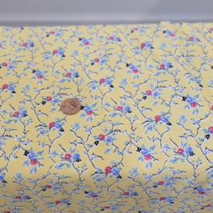1970&#39;s vintage yellow thin light tricot knit with small red and blue flower pretty print slinky clingy polyester fabric 6 yards by 40&quot; wide