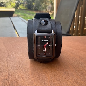 All Black Leather Cuff Watch with Date Feature