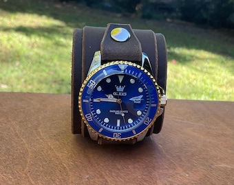 Dark Brown Leather Cuff Watch with Blue Face and Date Feature