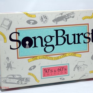 May include: A white box with a blue and yellow design for the board game "SongBurst: The Complete-The-Lyric Game 50's & 60's Edition".