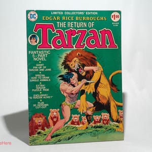 May include: A vintage comic book cover featuring Tarzan fighting a lion. The cover is green with the title "The Return of Tarzan" in large red letters. The comic book is a limited collectors' edition and includes a 5-part novel, a giant pin-up of Tarzan and Jane, a special how-to-draw jungle animals section, an extra Tarzan puzzle page, and a 3D diorama cut-out.