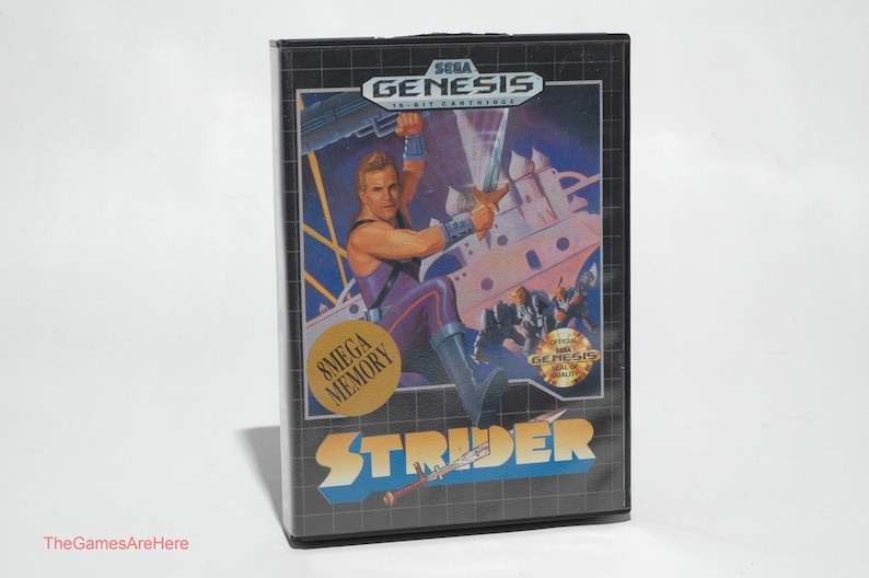 May include: A black Sega Genesis game cartridge case featuring the game "Strider." The cover art depicts a muscular man wielding a sword, with the Sega Genesis logo at the top. The game title is in a blue and white font.