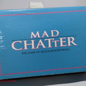 May include: A blue box with the words "MAD CHATTER" in white letters and the text "THE GAME OF QUICK DESCRIPTIONS" in smaller white letters.