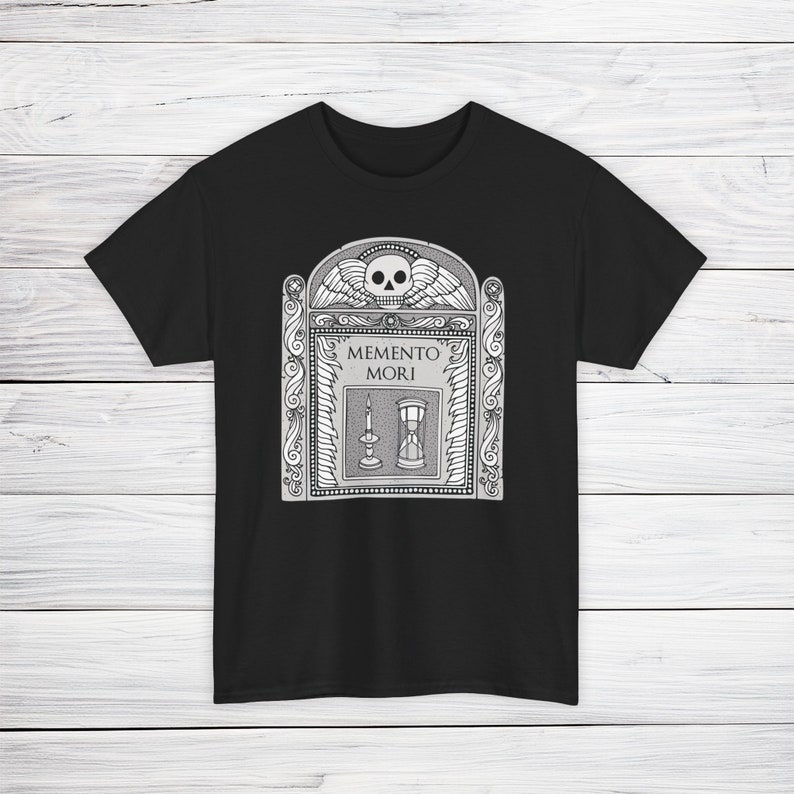 Illustration of a grave stone from the 1800s with a skull, candle, and hourglass on it. States Memento Mori. Design on a t-shirt.
