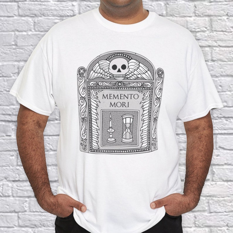 Illustration of a grave stone from the 1800s with a skull, candle, and hourglass on it. States Memento Mori. Design on a t-shirt.