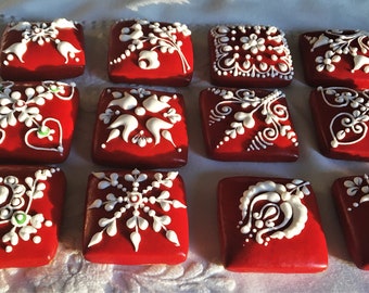 Bite size of Gingerbread cookies  with folk motifs