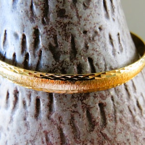 MONET Brushed Gold Tone Bangle, 1/4" wide