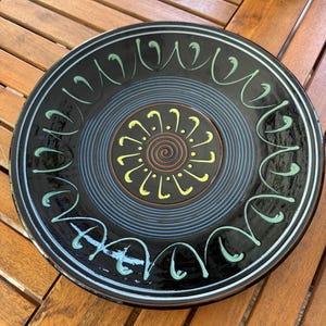 Spanish ceramic wall plate  by Puigdemont from Catalan  Signed 12.25 in