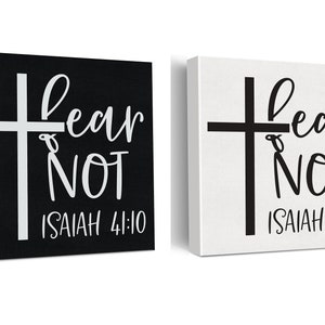May include: Two square canvas prints with a black and white cross and the text "Fear Not" with the scripture reference "Isaiah 41:10".