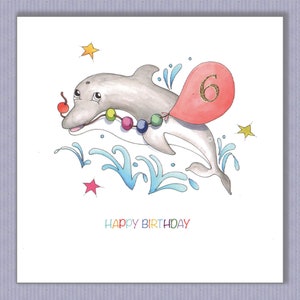 PK152 Carte d'anniversaire dauphin.Idéale pour fille ou garçon. Je peux ajouter n'importe quel âge sur le ballon ou le laisser vide si vous le souhaitez. Design par Paula