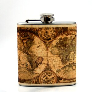 May include: A stainless steel flask with a vintage world map design. The flask has a silver cap and a hinged lid.
