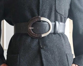 Cinturón ancho de cuero trenzado con hebilla metálica de MIKA SAROLEA Paris, talla 85/34