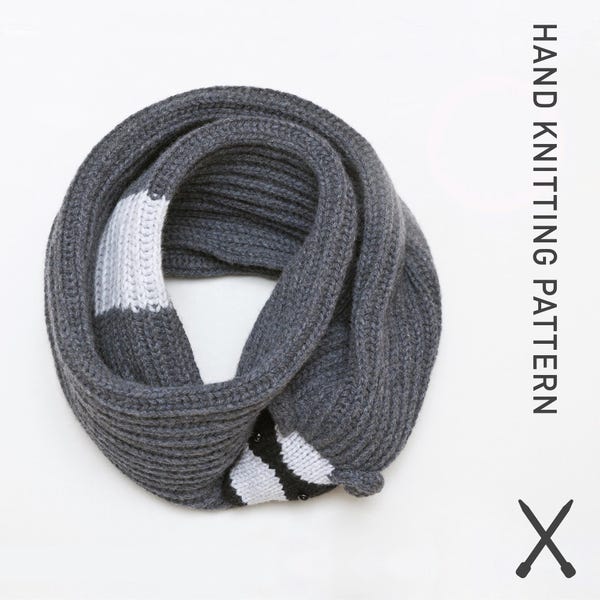 May include: Gray knitted infinity scarf with white and black stripes. HAND KNITTING PATTERN is written on the right side of the image.