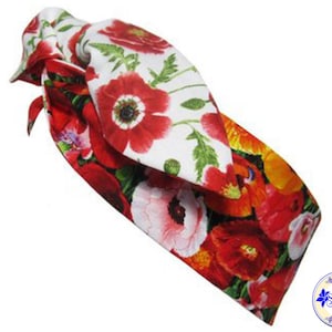 May include: A white headband with a red and white floral pattern featuring poppies. The headband is tied in a knot at the top.