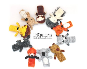 May include: A set of ten finger puppets featuring various animals, including a lion, fox, raccoon, koala, and red panda. The puppets are crocheted in a variety of colors, including brown, gray, orange, and yellow. The puppets are arranged in a circle on a white background. The text "LHCpatterns Little Handmade Cuties" is visible in the center of the circle.
