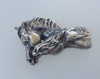 Nuzzling  horses polished pewter pendant for necklace .  Authentic original design Zimmer