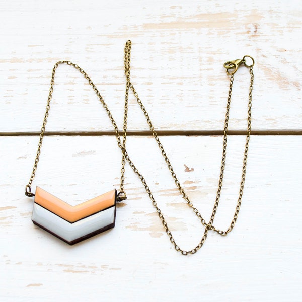 Peach and grey double chevron necklace made with laser cut wood and resin