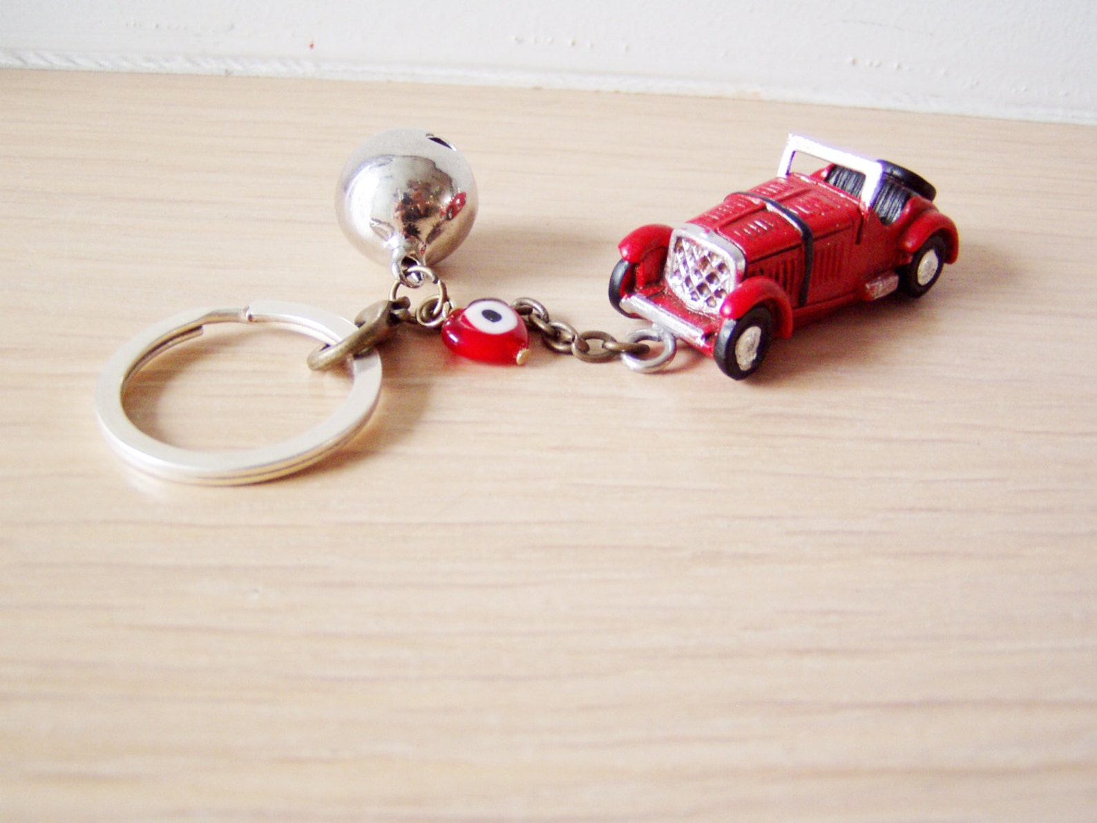 Antique car key chain with bell and eye in red or yellow | Etsy