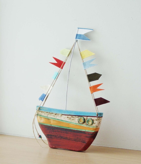 stoneware clay boat sculpture with wire mast and fabric flags Greek sailing boat colorful boat sculpture Ceramic sailing boat with colourful flags
