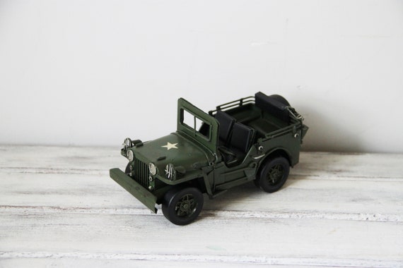 Green army jeep, retro army jeep miniature, collectible tin replica of army jeep, vintage classic jeep miniature