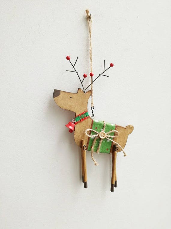 Reindeer ornament, wooden, Christmas tree ornament of reindeer in profile, brown green reindeer with bell and saddle, rustic, Xmas decor