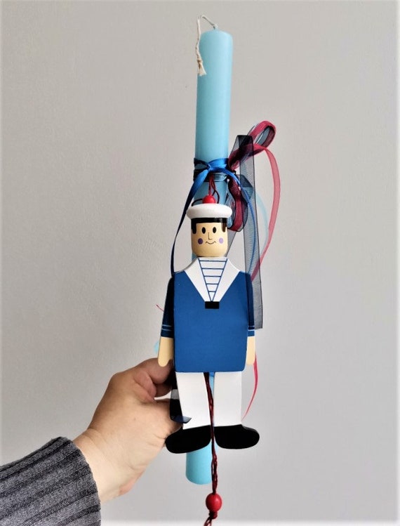 Greek Easter candle with sailor marionette, blue cylindrical candle for boys with wooden marionette of boy sailor