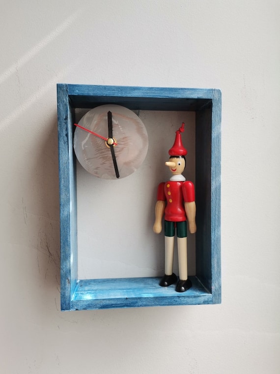 Pinocchio wooden clock, wooden frame clock with Pinocchio figurine, wooden clock with glued Pinocchio toy