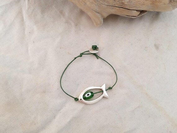 Fish and eye bracelet, green waxed cord bracelet, silver fish outline with green eye bead, boho friendship bracelet, unisex fish bracelet