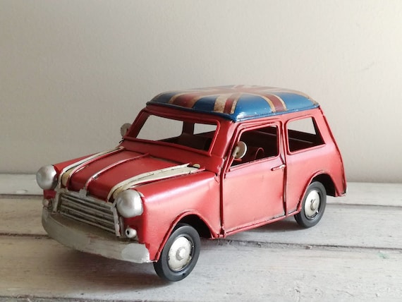 Red mini car miniature with British flag, vintage, collectible miniature, tin mini car replica with Union Jack rooftop, English car gift