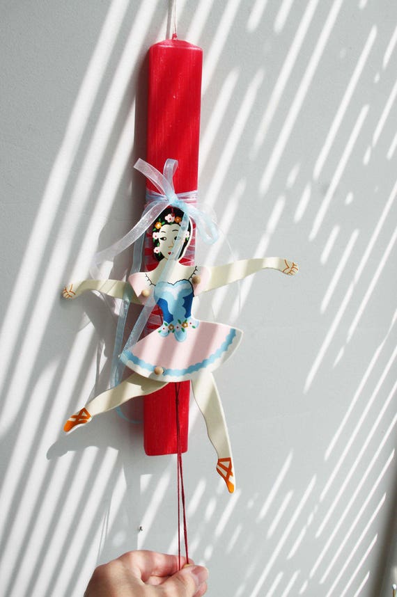 Greek Easter candle with ballerina marionette, square, red candle with pink, blue and white wooden ballerina marionette, Greek Lambada