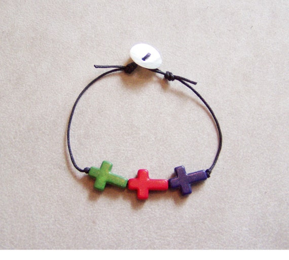 Sideways crosses colorful bracelet on a black cord